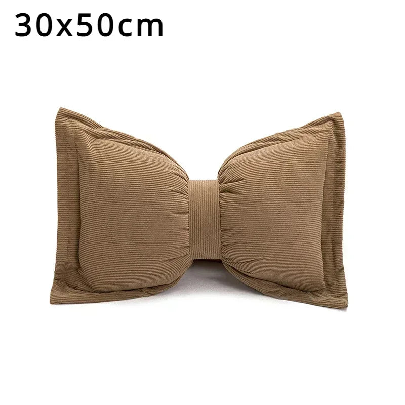 Bow Cushion with Pom-Poms